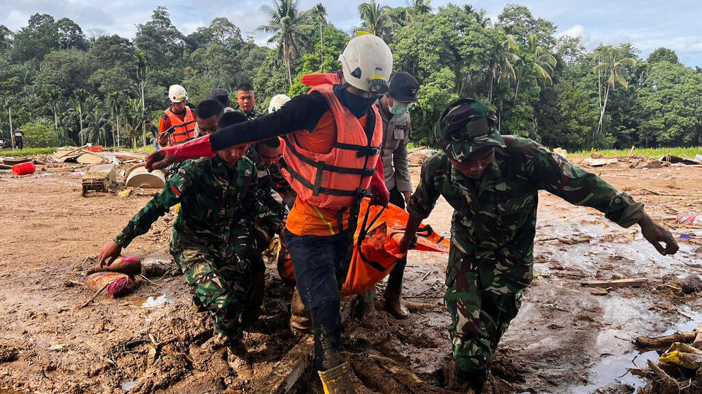 Looting reported as Indonesia and Sri Lanka battle deadly floods