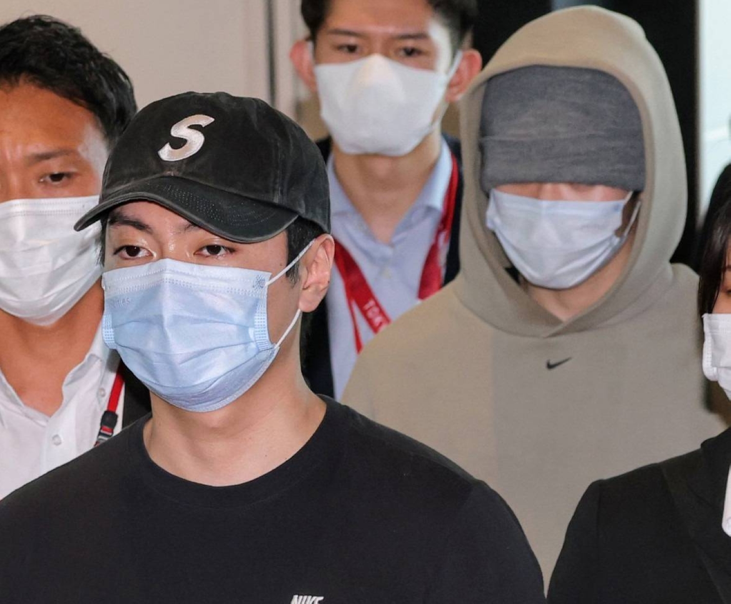  Japanese men held over fraud allegations after transfer from Indonesia 